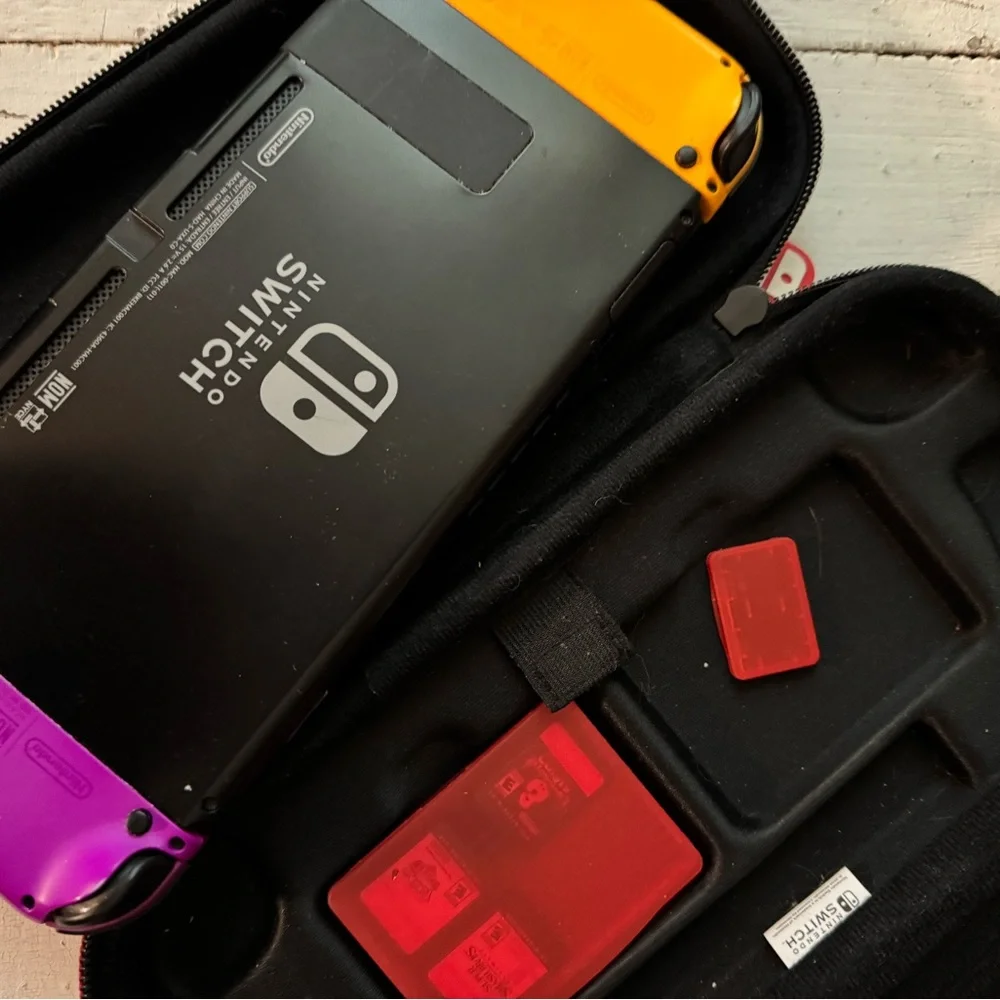Nintendo Switch with Purple and Orange Joy-Con